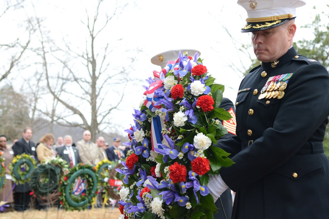 Col. David Maxwell, Marine Corps Base Quantico base commander, carries a presidential wreath to the resting place of James Madison, the fourth president of the United States of America. Maxwell was selected by President Barack Obama to present the wreath at Madison's obelisk as part of a tradition of honoring all former commanders-in-chief.