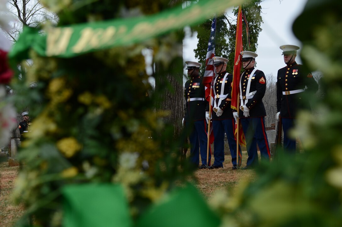 The Marine Corps Base Quantico Color Guard stands at ease during the proceedings of the James Madison wreath laying ceremony on March 16, 2014. Each year, wreaths are laid at the final resting places of former United States Presidents across the nation.