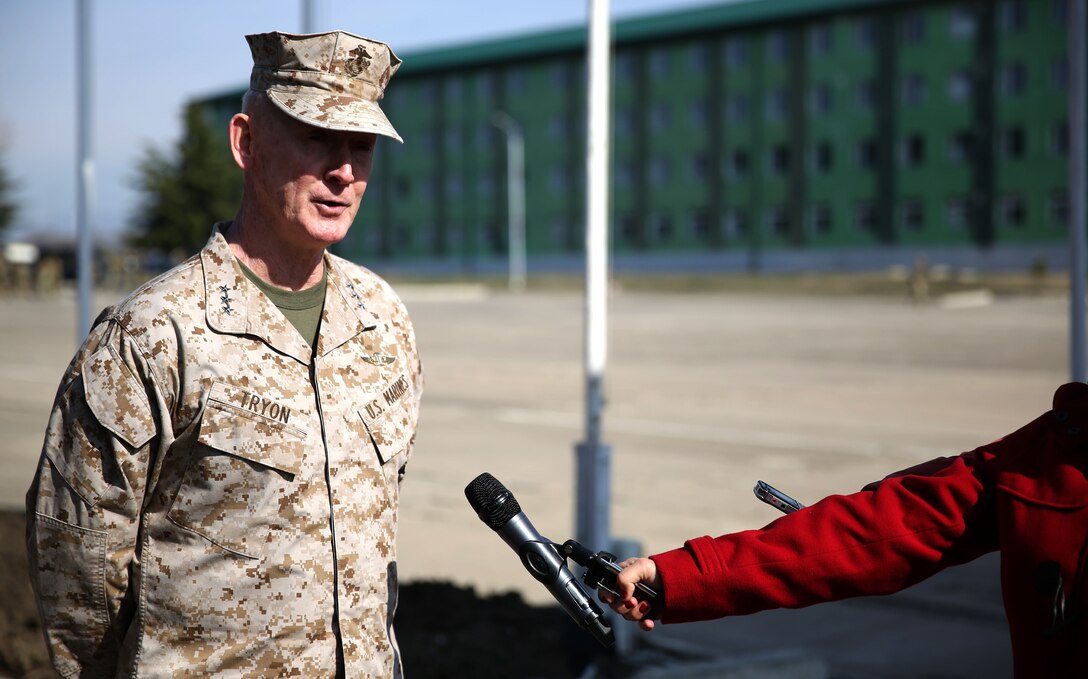United States Marine Corps Lt. Gen. Richard Tryon, commander of U.S. Marine Corps Forces Command and U.S. Marine Corps Forces, Europe, speaks to the local press regarding the departure ceremony for the Georgian Special Mountain Battalion and 23rd Bn., along with a detachment of Marines from Georgian Liaison Team 12, who are deploying to Afghanistan as part of the International Security Assistance Force, March 20, 2014. Tryon visited Georgia to tour the Georgian National Defense Academy and to attend the departure ceremony. (Official Marine Corps photo by Lance Cpl. Scott W. Whiting, BSRF PAO/ Released)