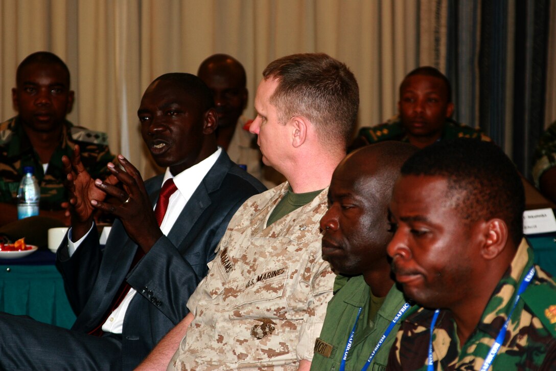 MCFEA G2, LtCol Vernon Williams and Kenyan Defense Attaché to Tanzania, Col Cyrus Oguna as Col Oguna provides insights on the FINEX brief provided by the MIBOC-A students. Background: Tanzanian and Burundi students.