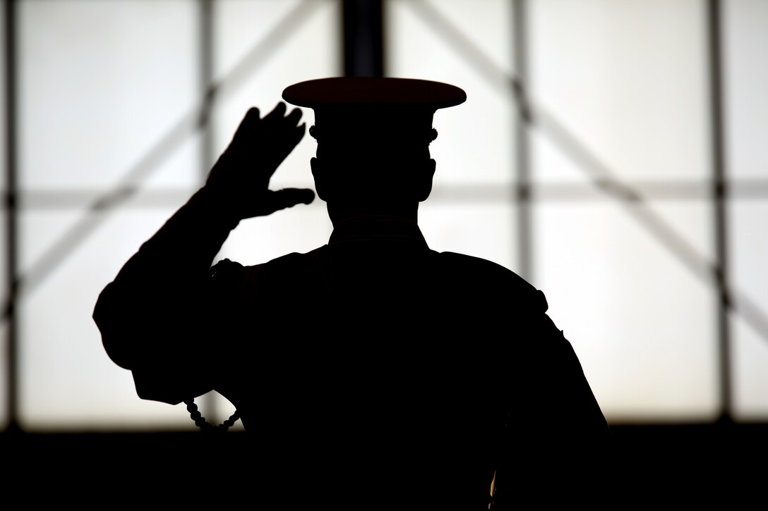 The world-renowned Marine Corps Color Detachment performs at Marine Corps Air Station Beaufort, March 18. The detachment is composed of three performing ceremonial units from Marine Barracks, Washington, D.C.: the Marine Corps Drum and Bugle Corps, the Marine Corps Silent Drill Platoon, and the Marine Corps Color Guard. Each year this highly skilled unit travels worldwide to demonstrate the discipline and professionalism of United States Marines.