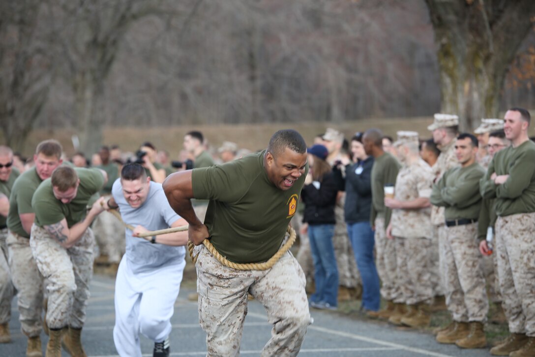 Marines from Marine Corps Base Quantico pull a Humvee during the basewide field meet held on March 21, 2014, at Butler Stadium. More than 15 teams competed in several events like relays, games and tug-of-war.