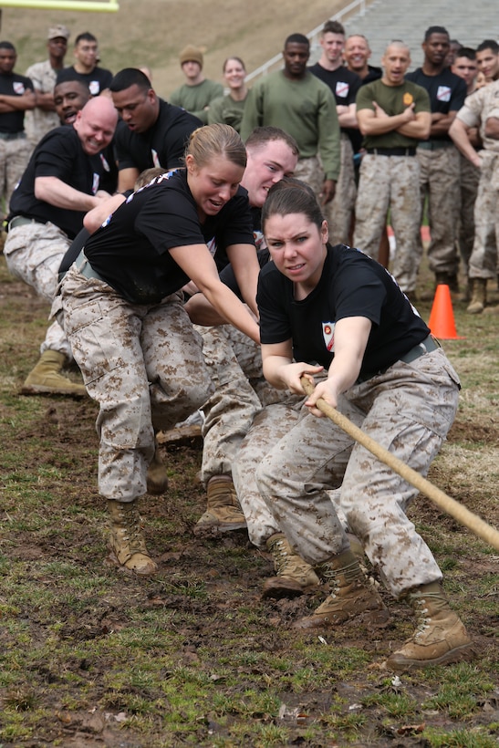 Marines from Marine Corps Embassy Security Group pull on a rope during the tug-of-war event of the Marine Corps Base Quantico Field Meet held on March 21, 2014, at Butler Stadium. More than 15 teams from all over MCBQ participated in the meet with Service Co. winning the whole event.
