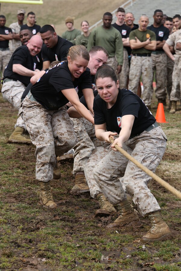 Marines from Marine Corps Embassy Security Group pull on a rope during the tug-of-war event of the Marine Corps Base Quantico Field Meet held on March 21, 2014, at Butler Stadium. More than 15 teams from all over MCBQ participated in the meet with Service Co. winning the whole event.
