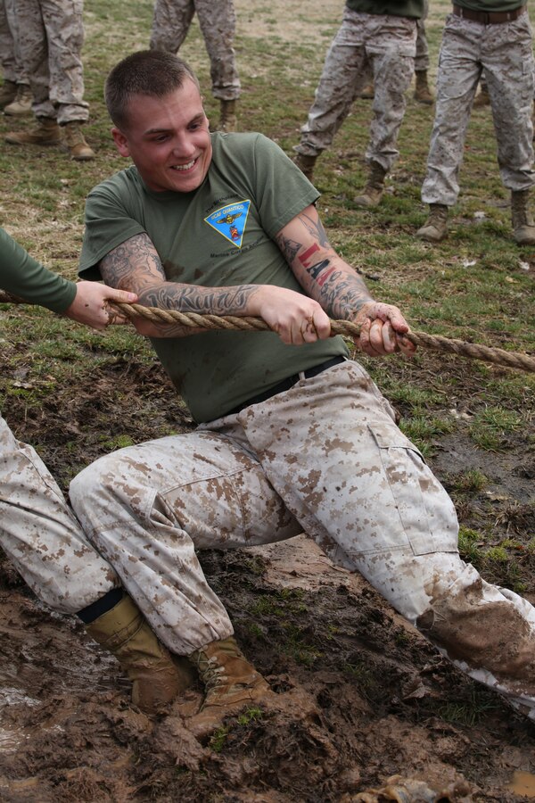 A Marine from Marine Corps Air Facility pulls on the rope during the tug-of-war event for the Marine Corps Base Quantico Field Meet on March 21, 2014, at Butler Stadium. Several teams from all over the base competed in the event.