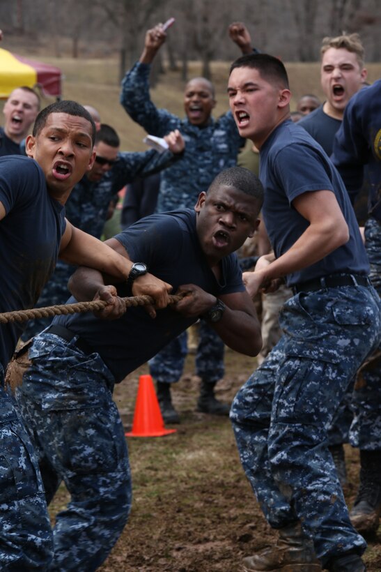 The Navy corpsmen stationed on Marine Corps Base Quantico, pull hard on a rope during the tug-of-war event during the basewide field meet held at Butler Stadium on March 21, 2014. They were the only non-Marine team to compete in the meet and placed in two events, weapons assembly and an exercise relay.