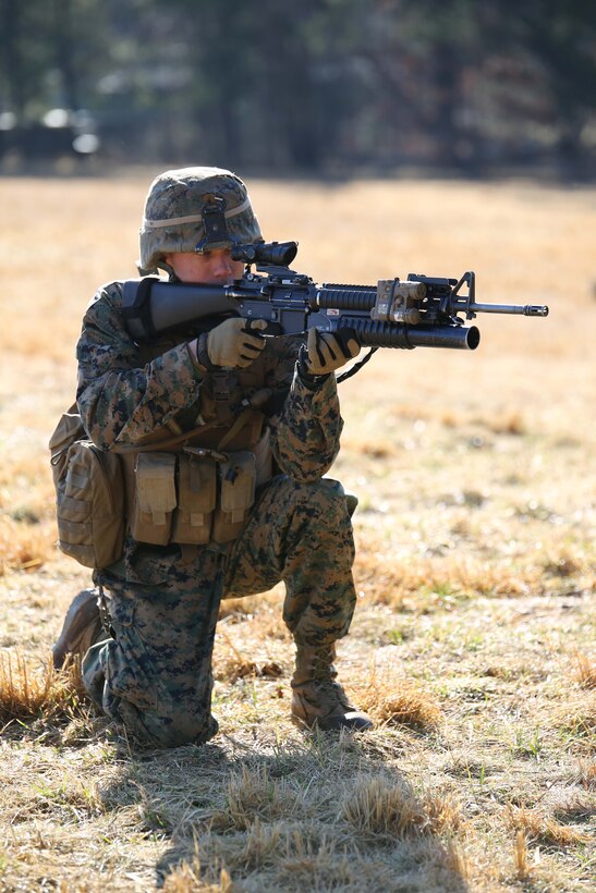 1st Lt. Bill Lining, fire team leader,  practices squad movements during a field exercise at Range 5 aboard Marine Corps Base Quantico on March 21, 2014. The Basic School Marines will conduct four field exercises before graduating the six-month course. 