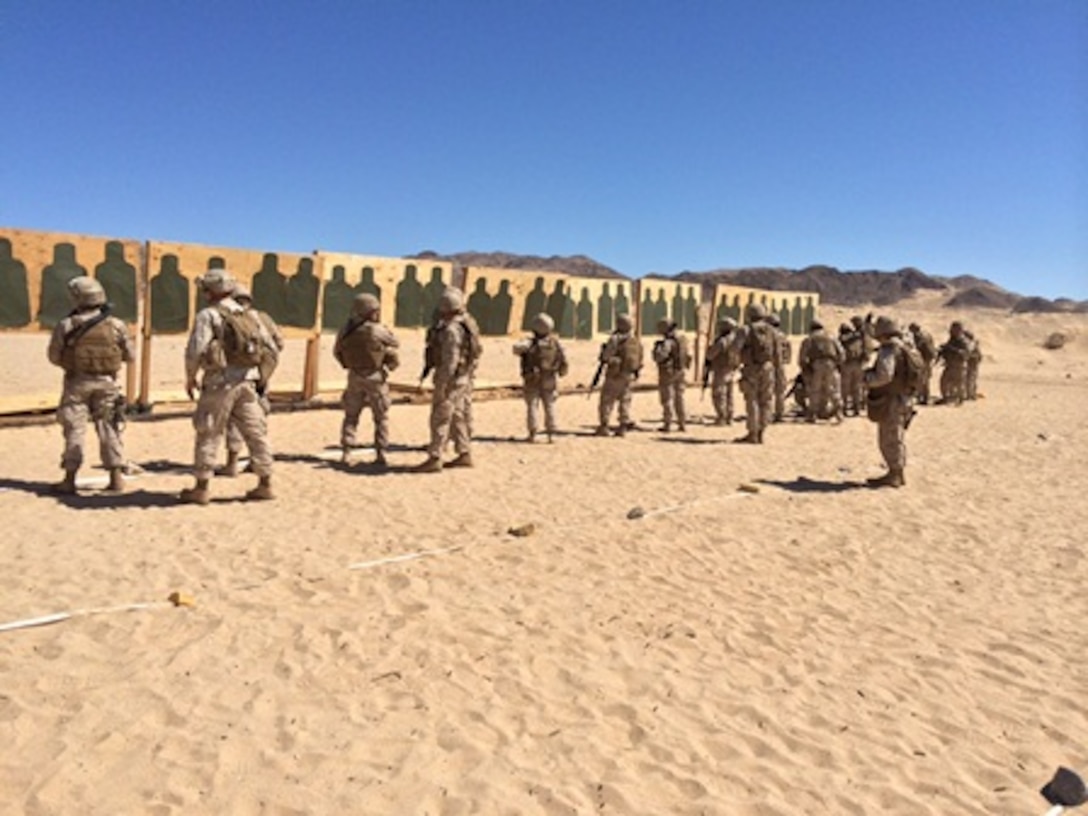 29 PALMS - Marines from Headquarters and Service Company, Combat Logistics Battalion 1 participate in pre-deployment training program practice shooting drills as part of combat marksmanship program (CMP).  The CMP is designed to ensure Marines gain experience with moving, shooting, pivoting and engaging multiple targets.