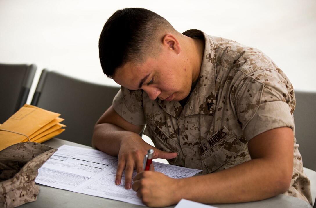 Lance Cpl. James Aaron Back, heavy engineering mechanic with Marine Air Control Squadron 1, fills out a form to donate blood aboard Marine Corps Air Station Miramar, Calif., March 25. The Naval Medical Center San Diego hosts blood drives aboard the air station for anyone to donate. 