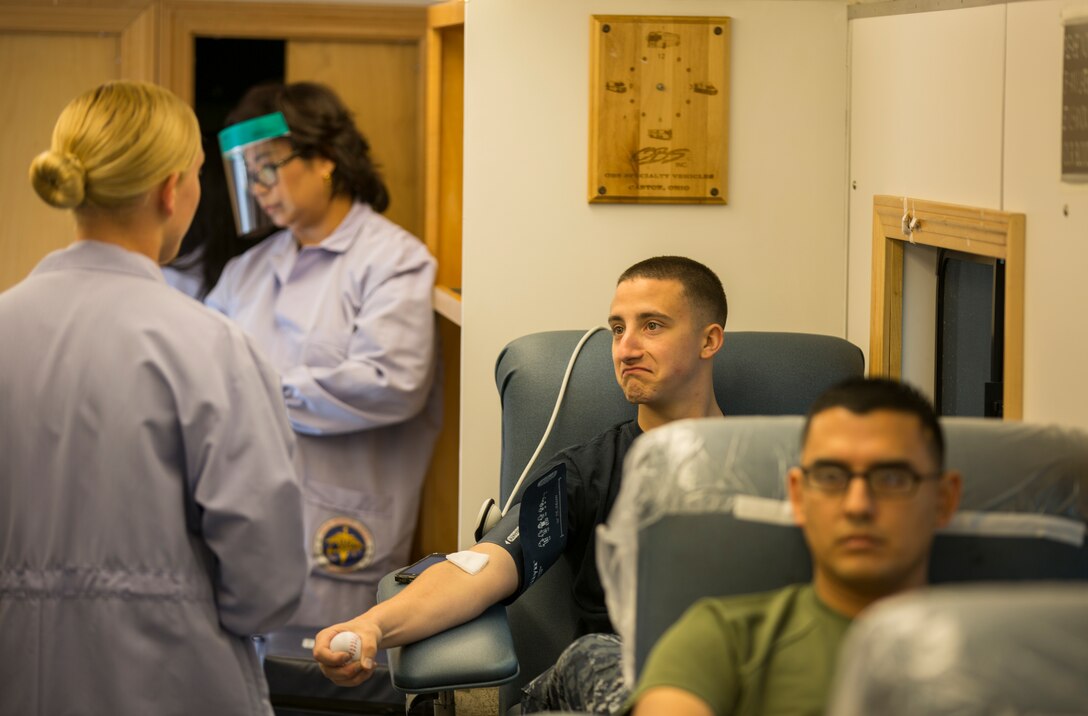 Marines and Sailors prepare to donate blood aboard Marine Corps Air Station Miramar, Calif., March 25. The Naval Medical Center San Diego holds blood drives aboard the air station for anyone to donate blood or apply to become a bone marrow donor. 