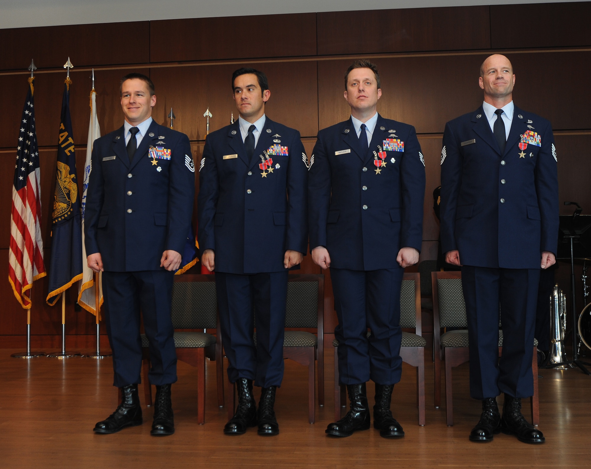 Combat controllers with the Oregon Air National Guard's 125th Special Tactics Squadron gather for a group photo following an award ceremony, March 24, 2014, at the 41st Infantry Division Armed Forces Reserve Center at Camp Withycombe, in Clackamas, Ore. From left: Tech. Sgt. Doug Matthews received the rarely awarded Silver Star; Staff Sgt. Christopher Jones received the Bronze Star with Valor and first Oak Leaf Cluster; Staff Sgt. Matthew Matlock received the Bronze Star Medal with Valor and second Oak Leaf Cluster; and Tech. Sgt. George Thompson received the Bronze Star. (U.S. Air National Guard photo by Tech. Sgt. John Hughel, 142nd Fighter Wing Public Affairs/Released) 