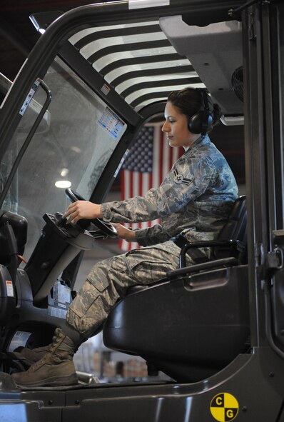 Airman 1st Class Janet Soto, 2nd Logistics Readiness Squadron shipping and distribution section, operates a 10K forklift on Barksdale Air Force Base, La., March 25, 2014. In order to operate a forklift, personnel must complete a computer based training module and then receive hands-on training from 2nd LRS Vehicle Operations Airmen on the fundamentals of operating a forklift. (U.S. Air Force photo/Senior Airman Benjamin Gonsier)