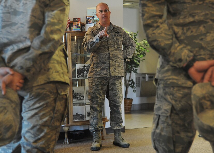 Chief Master Sgt. Michael Morris, 22nd Air Refueling Wing command chief, speaks to Airmen on the dorm staff during an immersion tour March 25, 2014, at McConnell Air Force Base, Kan. Morris visited the dorms to learn about the living conditions of the Airmen on base to see how he can improve them. (U.S Air Force photo/Senior Airman Maurice A. Hodges)