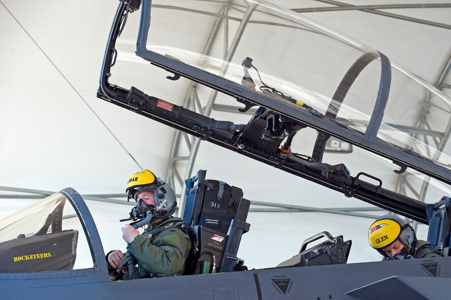 From left, Col. Lamar Pettus, 4th Fighter Wing vice commander, and Capt. Ryan Leavitt, 336th Fighter Squadron F-15E Strike Eagle weapon systems officer, prepare for flight during RAZOR TALON, March 21, 2014, at Seymour Johnson Air Force Base, N.C. RAZOR TALON is a joint-service training exercise designed to test war-fighting capabilities during contingency operations. (U.S. Air Force photo/Airman 1st Class Aaron J. Jenne)