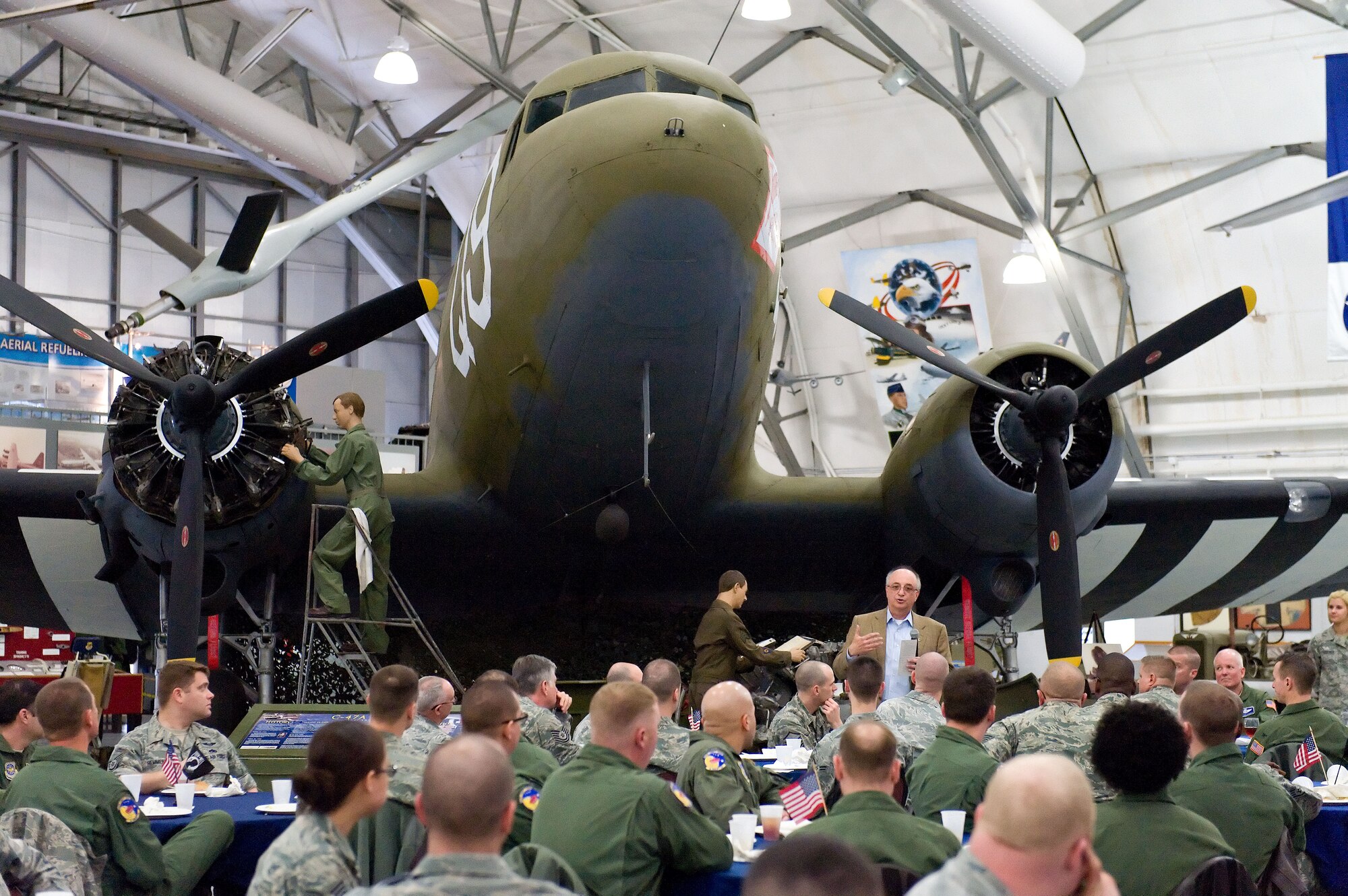 Ralph Galati, a former prisoner of war during the Vietnam War, speaks to Team Dover members March 19, 2014, at the Air Mobility Command Museum on Dover Air Force Base, Del. Galati joined the Air Force and served as a Weapons Systems Officer in the F-4 Phantom aircraft. He is the recipient of the Silver Star, the Bronze Star with Valor, the Purple Heart and other service medals. (U.S. Air Force photo/Roland Balik)