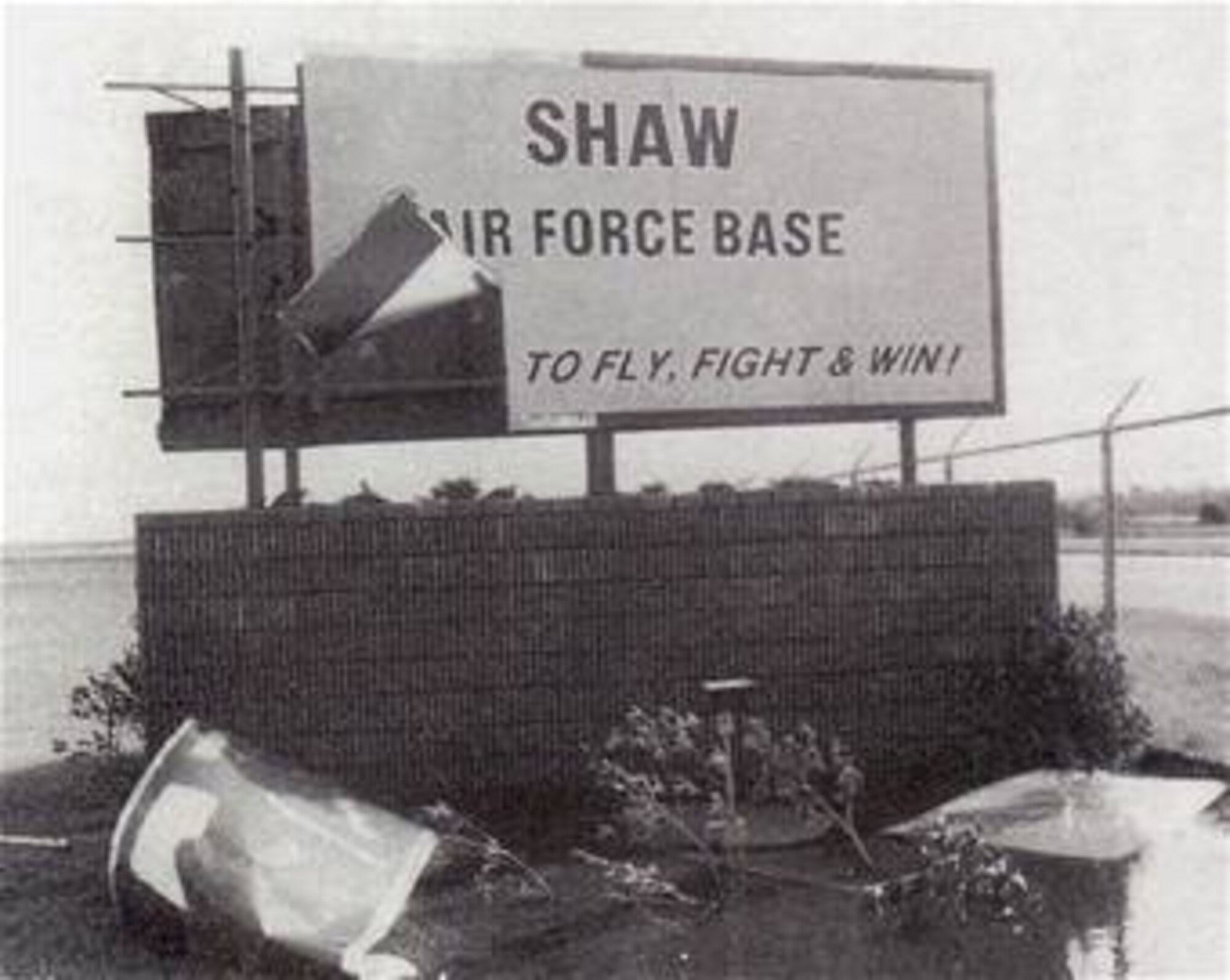 Damage is shown to the Shaw Air Force Base, S.C., Main Gate sign after Hurricane Hugo passed through South Carolina the morning of Sept. 22, 1989. No deaths or serious injuries were reported as a result of the storm and damage estimates to Shaw totaled to almost 47 million dollars. The 20th Civil Engineer Squadron emergency management team tries to keep all Airmen informed on what’s going on in the area either by briefs, Facebook, or television. (Courtesy of Airman Magazine)