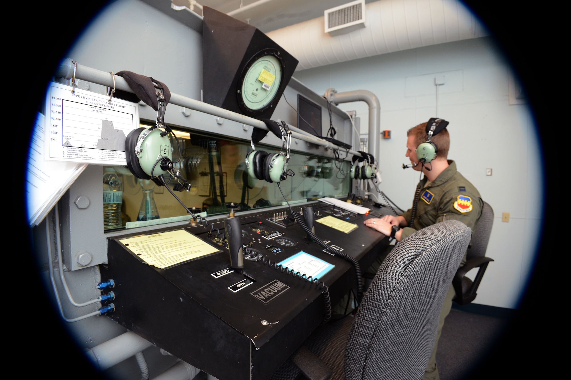 U.S. Air Force Capt. Stuart Sauls, 20th Aerospace Medicine Squadron Aerospace and Operational Physiologist, briefs the Aerospace Physiology trainees on what symptoms to look for when dealing with hypoxia, Shaw Air Force Base, S.C., March 13, 2014. Symptoms of hypoxia range from a tingling sensation, hot and cold flashes, dizziness, headache, nausea, blurred vision, euphoria, and even belligerence. (U.S. Air Force photo by Airman 1st Class Jonathan Bass/Released)