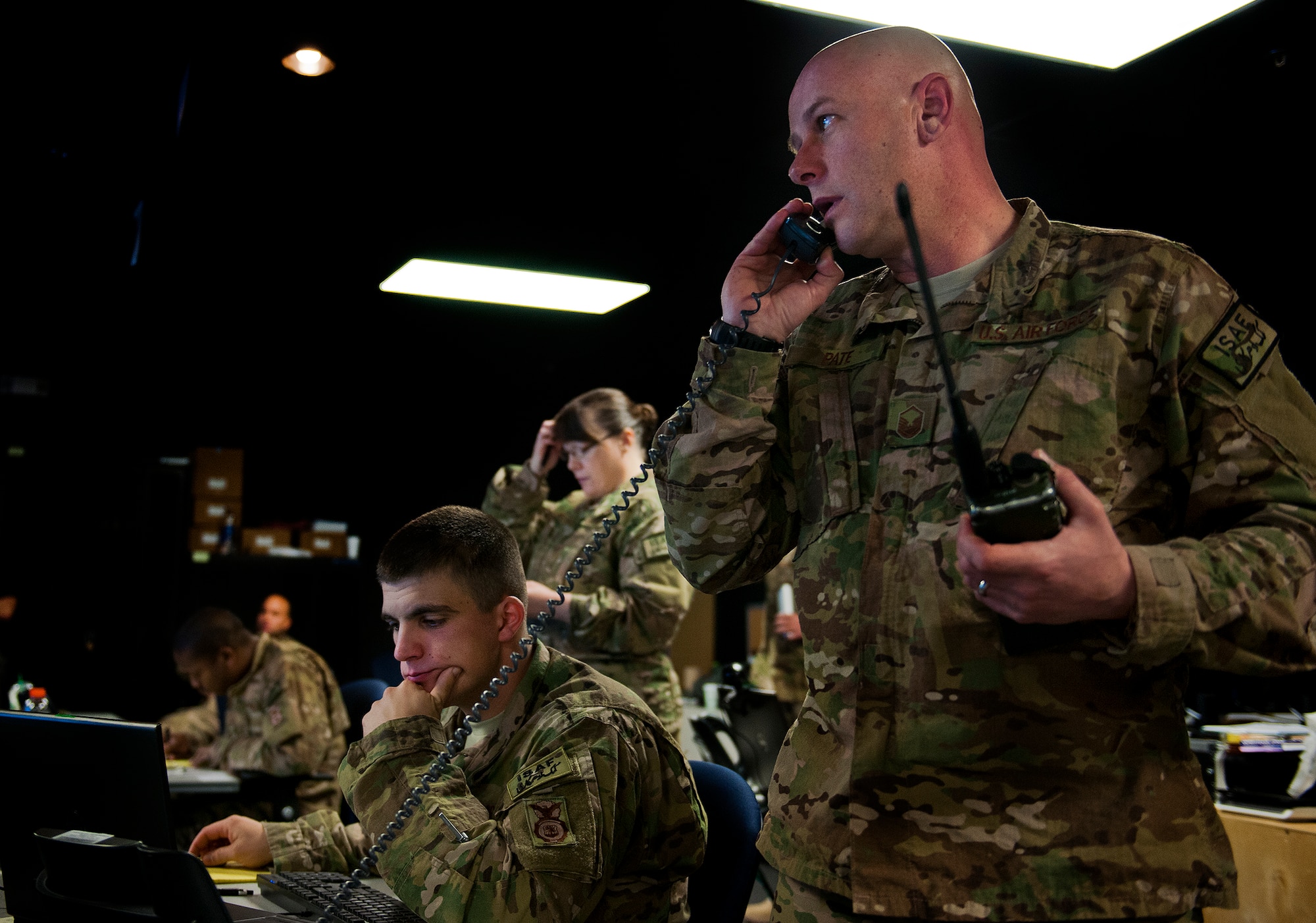 Master Sgt. Michael Pate, a reservist from the 446th Security Forces Squadron at McChord Air Force Base, Wash., serves a flightline security while others complete their tasks during a Joint Defense Operations Center exercise at Eglin AFB, Fla., March 21. The exercise simulated real-world force protection conditions at Kandahar Air Field, Afghanistan, to help deployers have specific location training before arriving to their new assignment. The training was facilitated by the 96th Ground Combat Training Squadron. (U.S. Air Force photo/Samuel King Jr.)