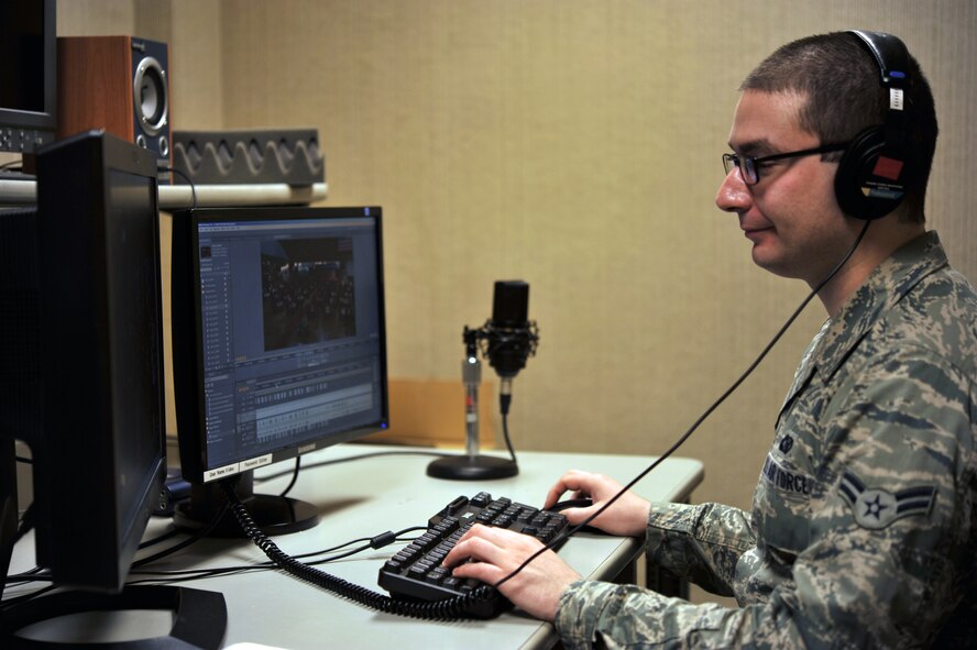 Airman First Class Nick Dastas, a broadcast journalist assigned to 88 Air Base Wing Public Affairs, edits video from a recent event.  Dastas’ work was recently recognized for excellence at the 2013 Air Force Media Contest in the Television Newsbreak category, as he garnered a second place award for his “Warrior Writers” news story.  (Air Force photo by Brian Duke)


