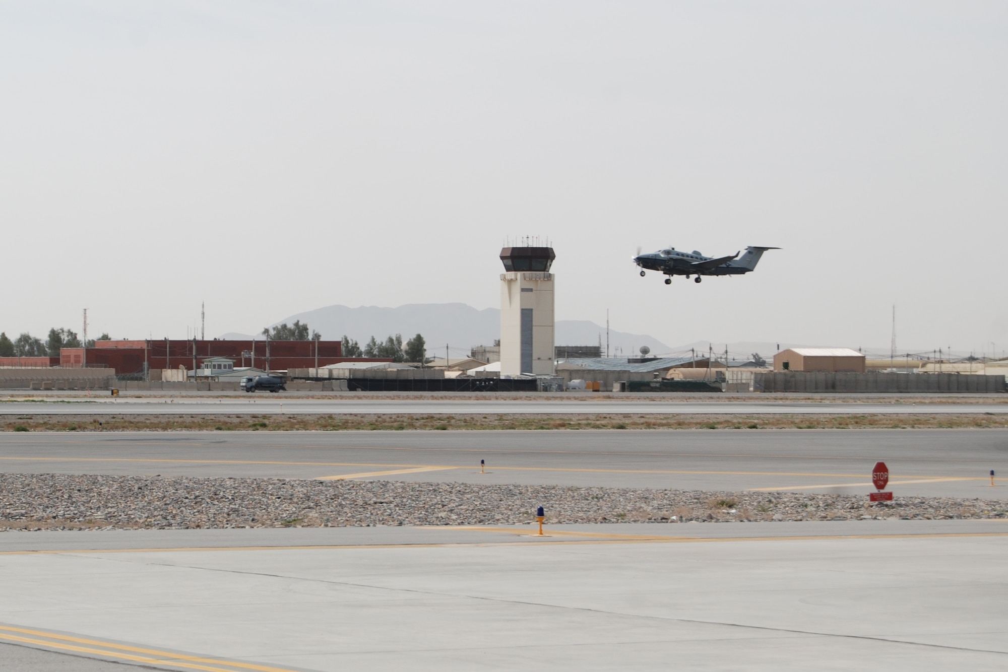 An MC-12W Liberty departs Kandahar Airfield, March 20, 2014. The MC-12W is assigned to and operated by the 451st Air Expeditionary Group. (U.S. Air Force photo by Capt. Brian Wagner/Released) 
