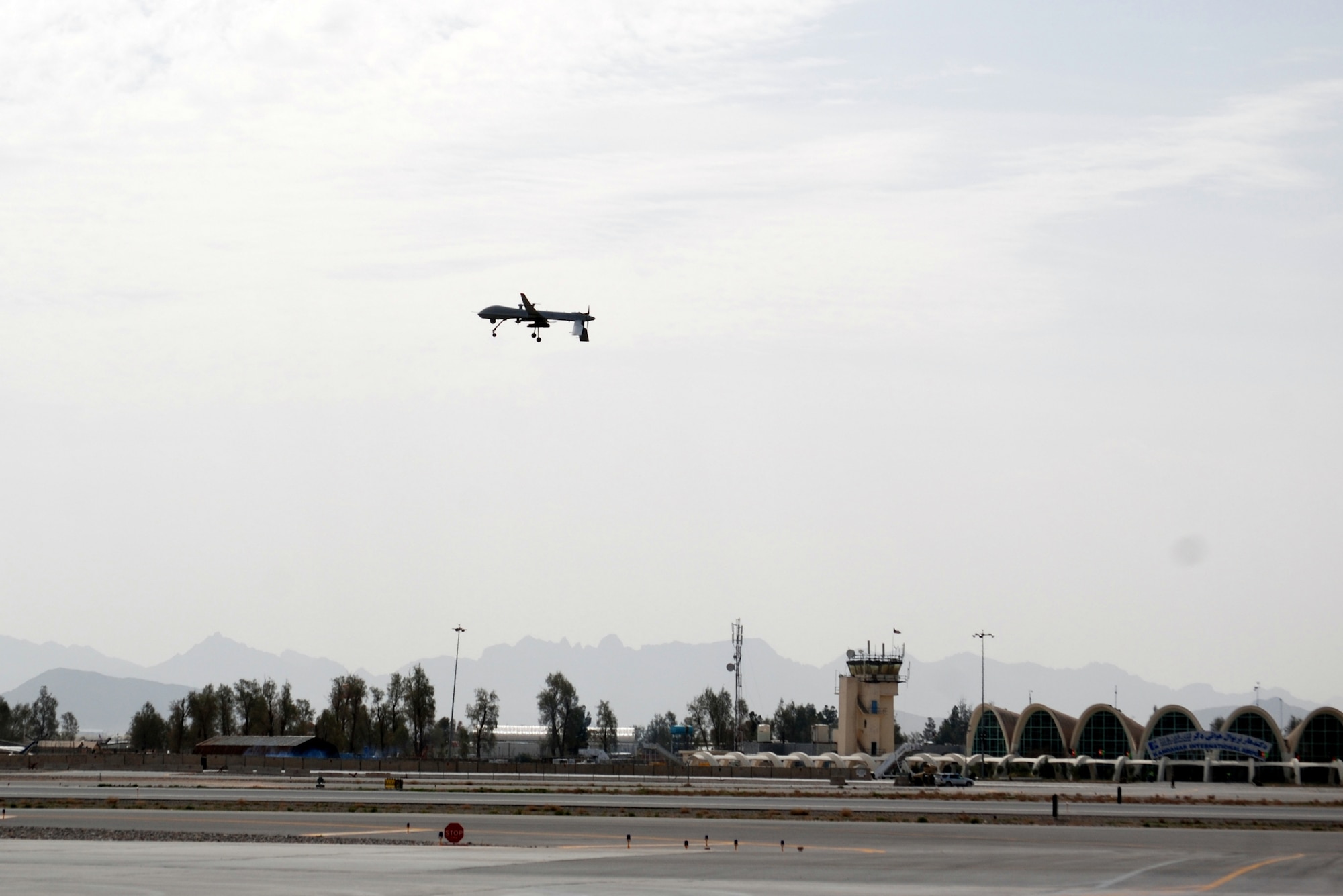 An MQ-1 Predator departs Kandahar Airfield, March 20, 2014. The MQ-1 is assigned to and operated by the 451st Air Expeditionary Group. (U.S. Air Force photo by Capt. Brian Wagner/Released)