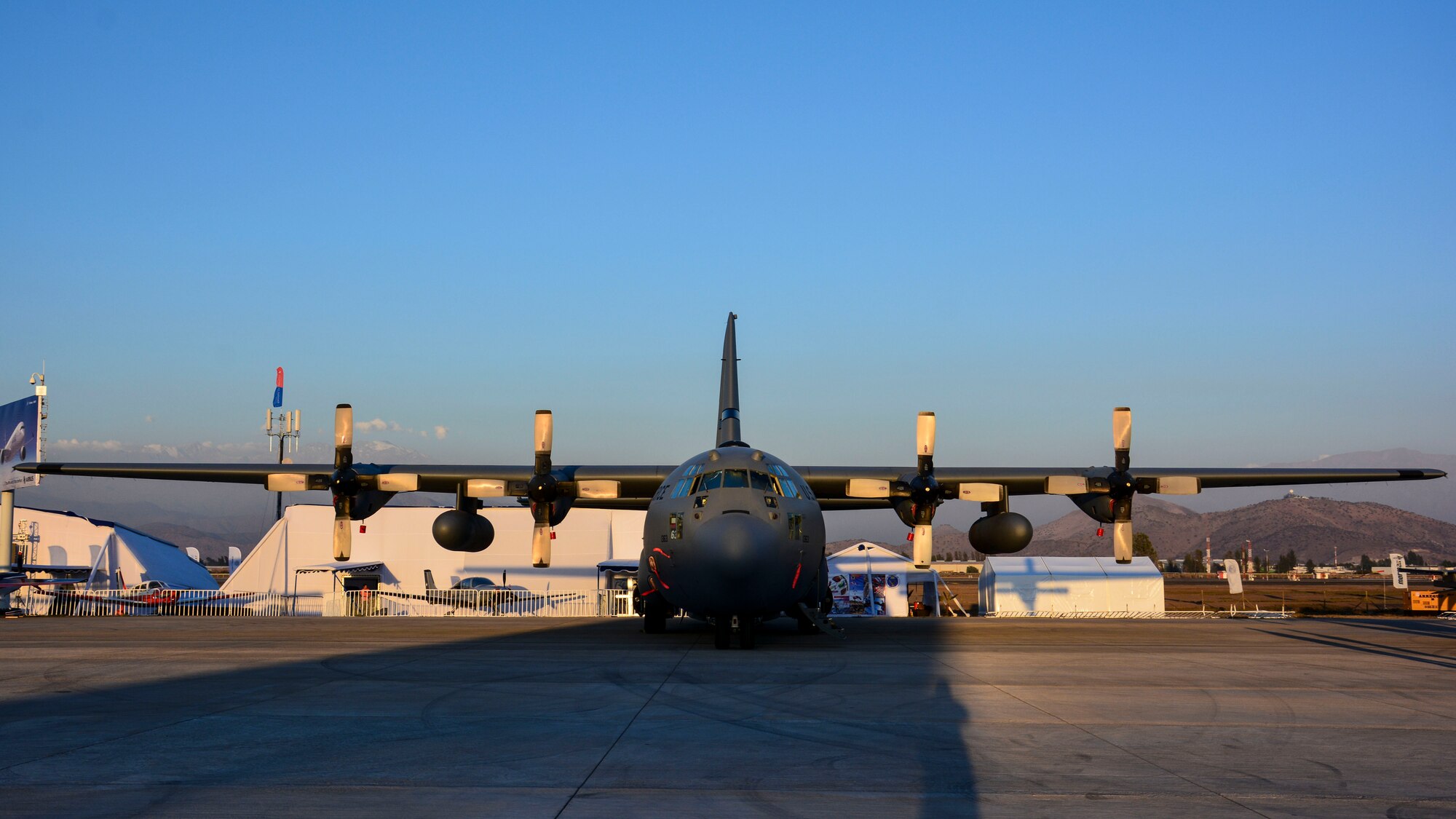 A U.S. Air Force C-130 Hercules sits on the ramp at the FIDAE airshow in Santiago, Chile, March 24. Nearly 60 U.S. airmen are participating in subject matter expert exchanges with Chilean air force counterparts during the week of FIDAE, and as part of the events will host static displays of the C-130 Hercules and F-16 Fighting Falcon during the FIDAE Air Show in Santiago, March 25 through 30. The exchanges, conducted regularly throughout the year, involve U.S. Airmen sharing best practices and procedures to build partnerships and promote interoperability with partner-nations throughout South America, Central America and the Caribbean. (U.S. Air Force photo by Capt. Justin Brockhoff/Released)