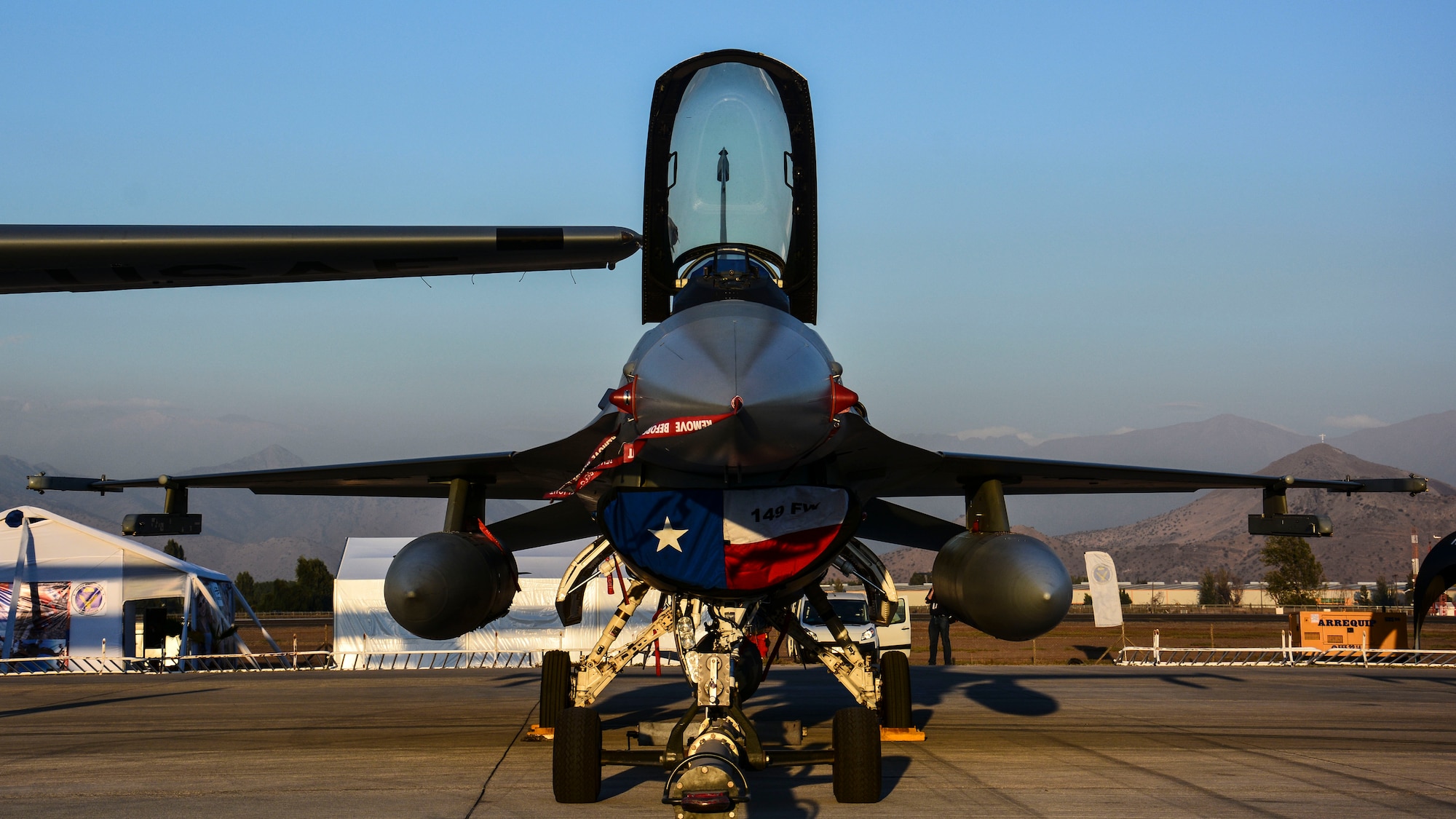 A U.S. Air Force F-16 Fighting Falcon sits on the ramp at the FIDAE airshow in Santiago, Chile, March 24. Nearly 60 U.S. airmen are participating in subject matter expert exchanges with Chilean air force counterparts during the week of FIDAE, and as part of the events will host static displays of the C-130 Hercules and F-16 Fighting Falcon during the FIDAE Air Show in Santiago, March 25 through 30. The exchanges, conducted regularly throughout the year, involve U.S. Airmen sharing best practices and procedures to build partnerships and promote interoperability with partner-nations throughout South America, Central America and the Caribbean. (U.S. Air Force photo by Capt. Justin Brockhoff/Released)