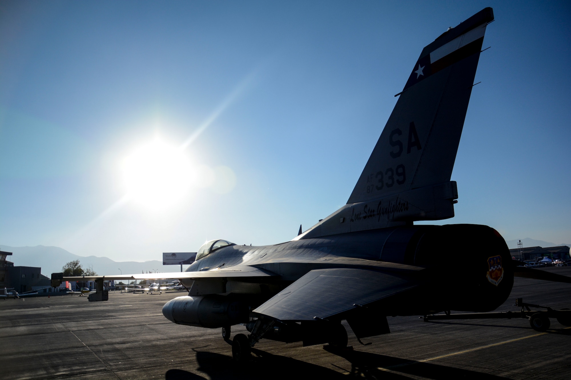 A U.S. Air Force F-16 Fighting Falcon sits on the ramp at the FIDAE airshow in Santiago, Chile, March 24. Nearly 60 U.S. airmen are participating in subject matter expert exchanges with Chilean air force counterparts during the week of FIDAE, and as part of the events will host static displays of the C-130 Hercules and F-16 Fighting Falcon during the FIDAE Air Show in Santiago, March 25 through 30. The exchanges, conducted regularly throughout the year, involve U.S. Airmen sharing best practices and procedures to build partnerships and promote interoperability with partner-nations throughout South America, Central America and the Caribbean. (U.S. Air Force photo by Capt. Justin Brockhoff/Released)
