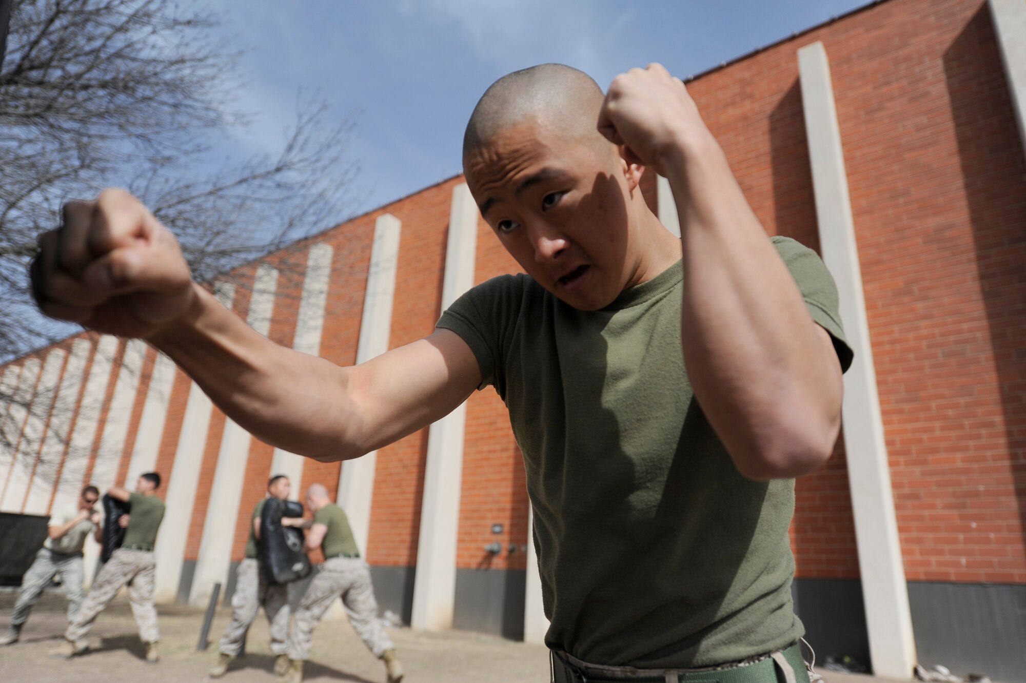GOODFELLOW AIR FORCE BASE, Texas –Marine Corps Lance Cpl. Gabriel J. Park, Marine Corps Detachment student, warms up with combat conditioning while participating in the Marine Corp Martial Arts Program here March 19. MCMAP is a combat system that shapes the warrior ethos of every Marine. (U.S. Air Force photo/ Staff Sgt. Austin Knox)