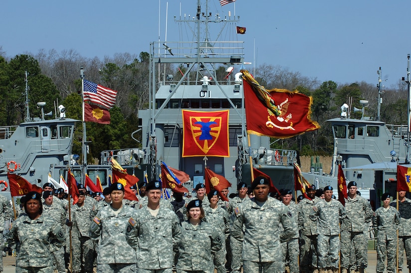 U.S. Army Soldiers from the 7th Transportation Brigade (Expeditionary) stand in formation during a transformation ceremony held at Fort Eustis, Va., March 21, 2014. The brigade will maintain global oversight of all Army terminal and watercraft capabilities. (U.S. Air Force photo by Senior Airman Teresa J.C. Aber/Released)