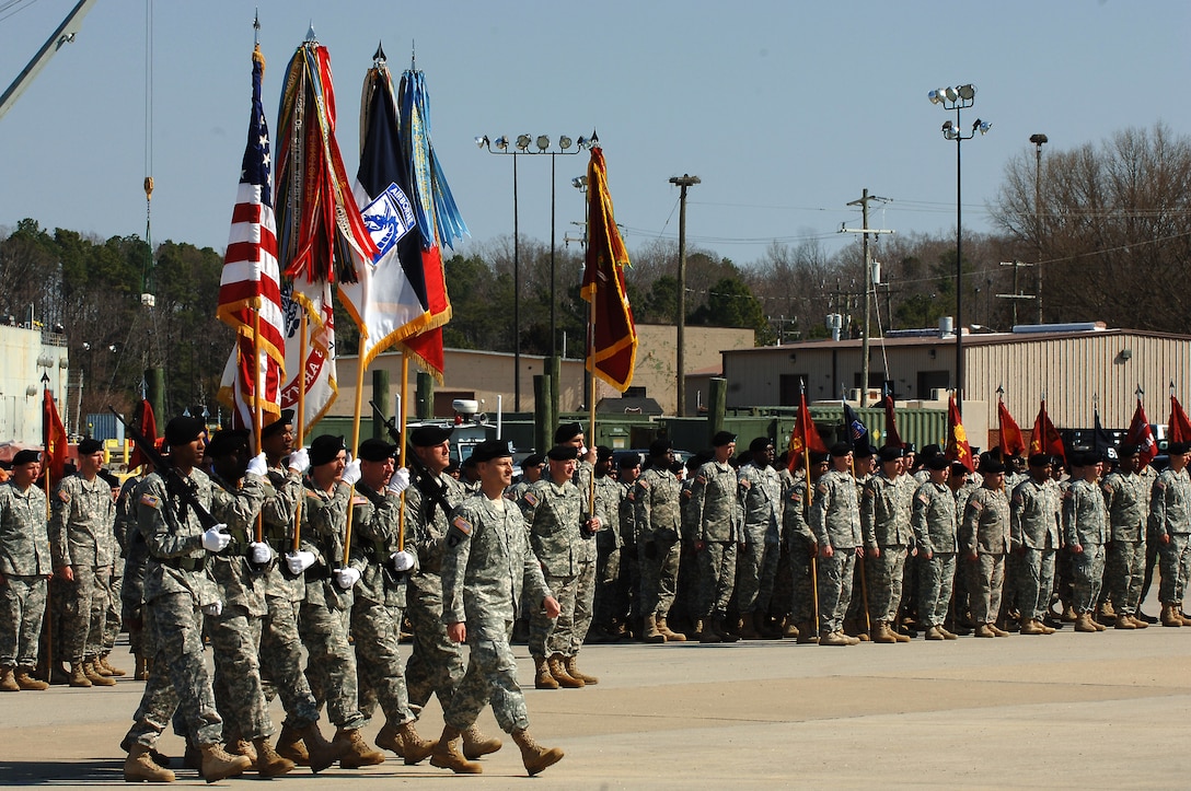 The Fort Eustis Honor Guard presents the colors during the transformation ceremony for the 7th Transportation Brigade (Expeditionary) at Fort Eustis, Va., March 21, 2014. The unit was activated during World War II as 7th Trans. Group (Composite), to command ports in the United Kingdom and Japan. (U.S. Air Force photo by Senior Airman Teresa J.C. Aber/Released)