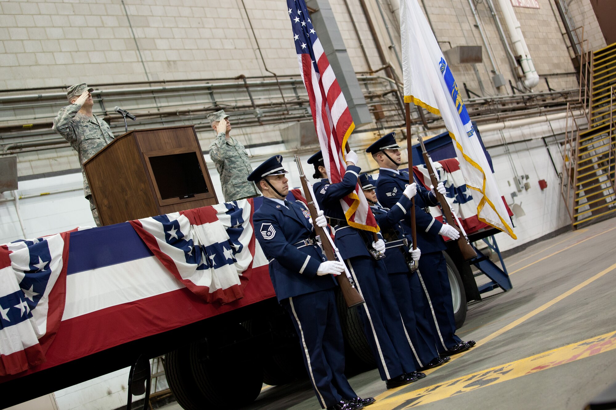 Members and family of the 102nd Intelligence Wing gather to say to their farewells to 31 members of the 212th Engineering Installation Squadron on Otis Air National Guard Base, Mass. on March 21, 2014. Members of the 212th will be deploying in support of Operation Enduring Freedom from late March to late November. (National Guard photo by Staff Sgt Jeremy Bowcock/Released)