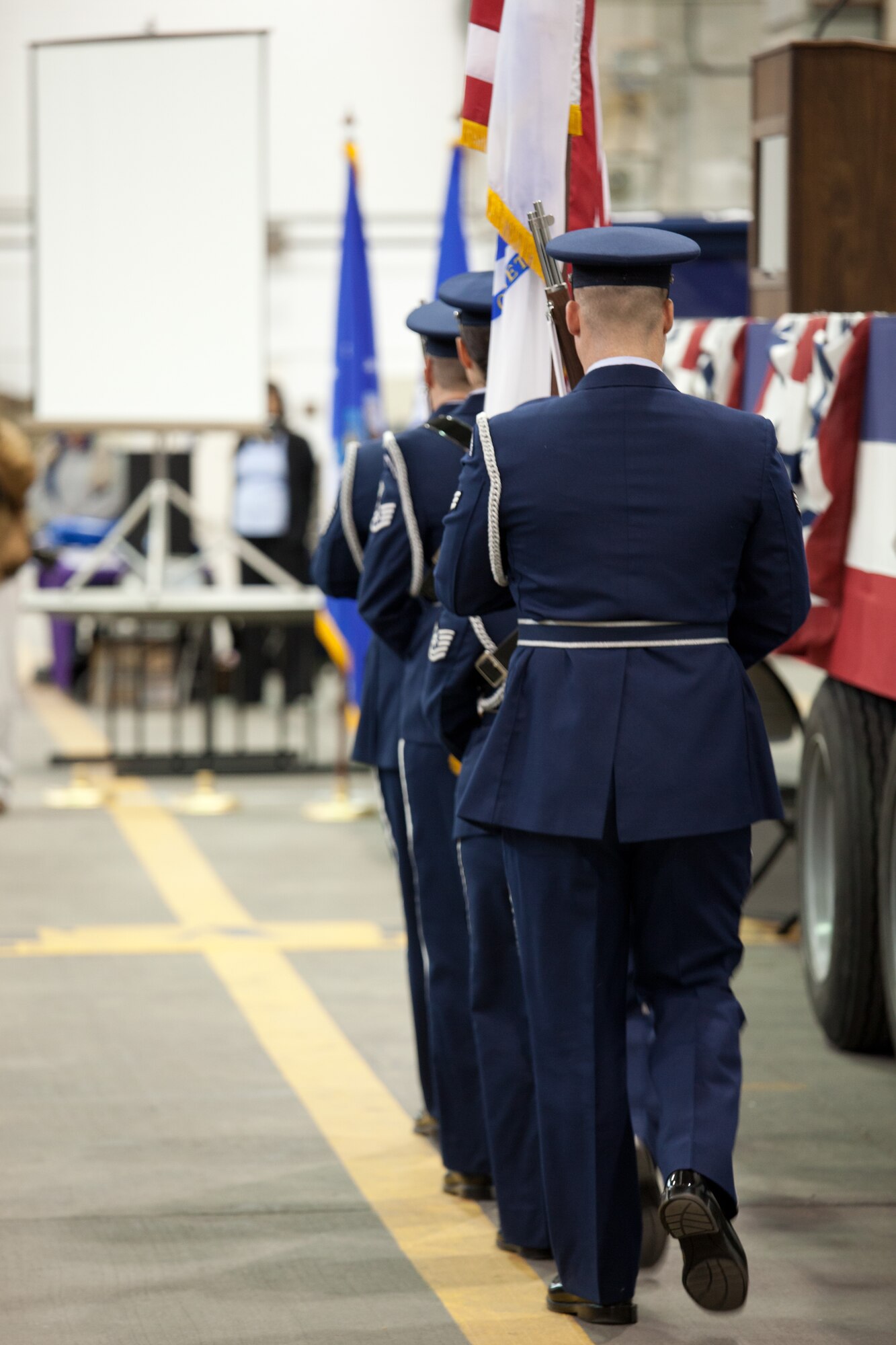 Members and family of the 102nd Intelligence Wing gather to say to their farewells to 31 members of the 212th Engineering Installation Squadron on Otis Air National Guard Base, Mass. on March 21, 2014. Members of the 212th will be deploying in support of Operation Enduring Freedom from late March to late November. (National Guard photo by Staff Sgt Jeremy Bowcock/Released)