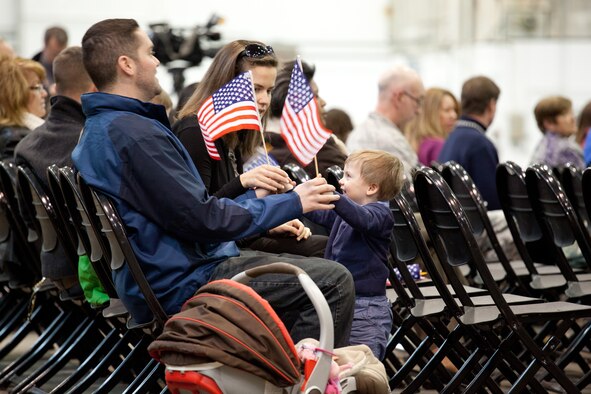 Members and family of the 102nd Intelligence Wing gather to say to their farewells to 31 members of the 212th Engineering Installation Squadron on Otis Air National Guard Base, Mass. on March 21, 2014. Members of the 212th will be deploying in support of Operation Enduring Freedom from late March to late November. (National Guard photo by Staff Sgt Jeremy Bowcock/Released)