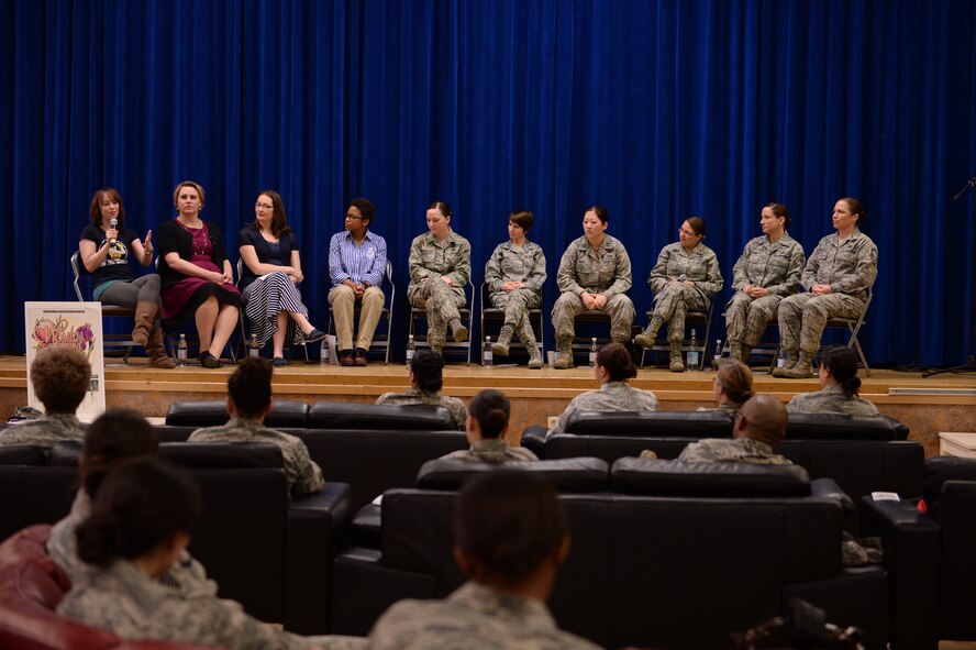 Women of all ranks and statuses participate in a panel discussion in celebration of Women's History Month March 20, 2014, at the Brick House at Spangdahlem Air Base, Germany. The panel event gave base members the opportunity to speak to influential women in the community. After the discussion ended, a social hour allowed for candid conversation with panel members. (U.S. Air Force photo by Senior Airman Alexis Siekert/Released)