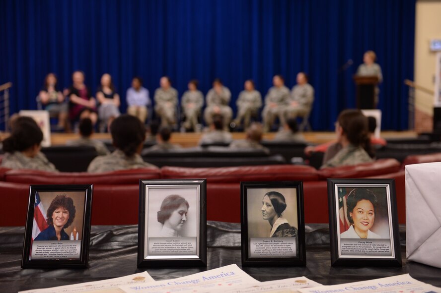 Photos of historically influential women are displayed during a Women's History Month event March 20, 2014, at the Brick House at Spangdahlem Air Base, Germany. The informal environment allowed for open communication between audience and panel members. Some of the topics discussed included mentorship, inspiration, challenges, changes and the future. (U.S. Air Force photo by Senior Airman Alexis Siekert/Released)
