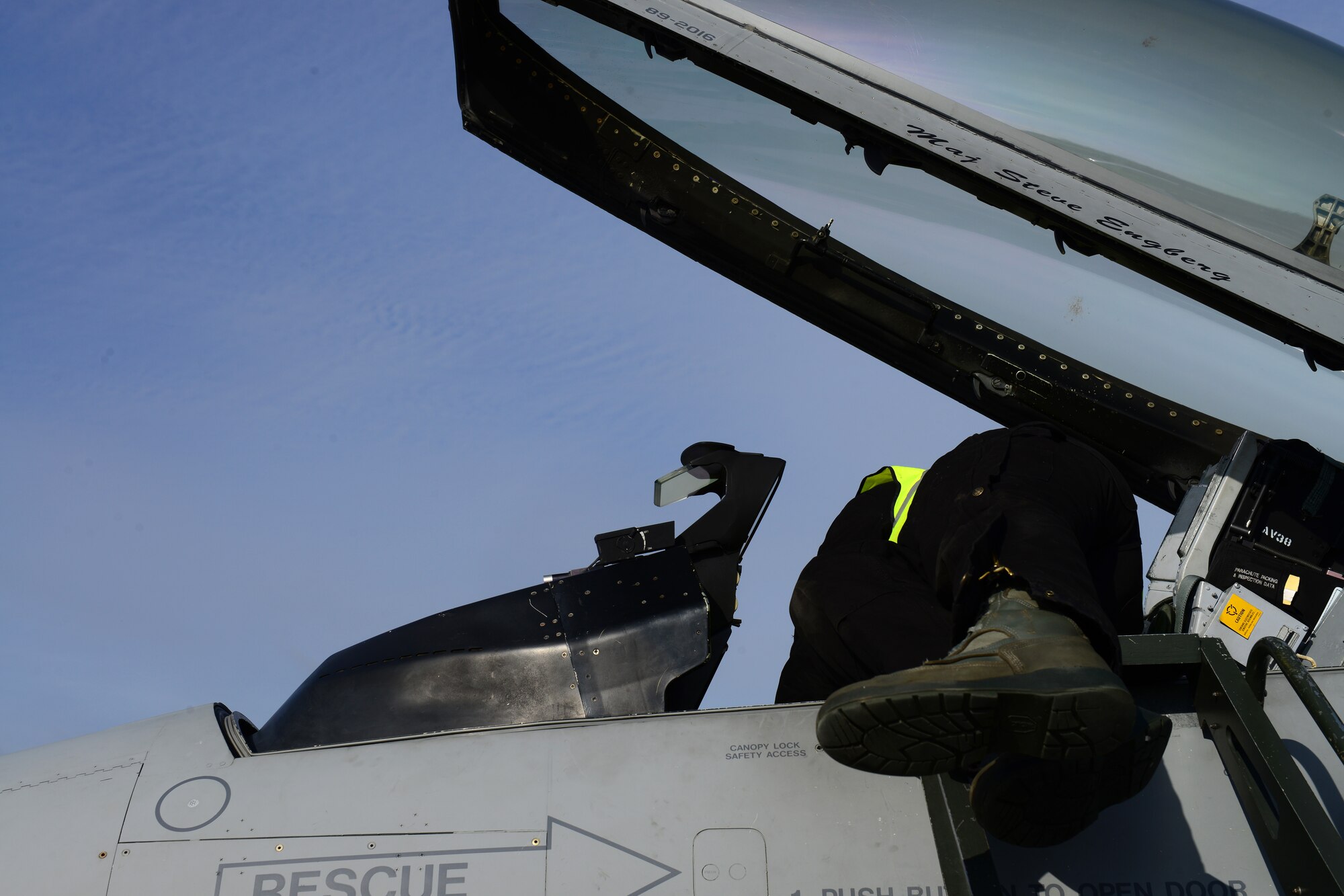 Senior Airman Sean Young, 31st Aircraft Maintenance Squadron crew chief, performs pre-flight checks on a 555th Fighter Squadron F-16 Fighting Falcon’s cockpit, March 20, 2014, at Łask Air Base, Poland. Throughout the past week, maintainers from the 31st AMXS, the 555th Aircraft Maintenance Unit and various other maintenance flights have worked together to maintain and repair F-16s involved with numerous training sorties. (U.S. Air Force photo/Airman 1st Class Ryan Conroy/Released) 