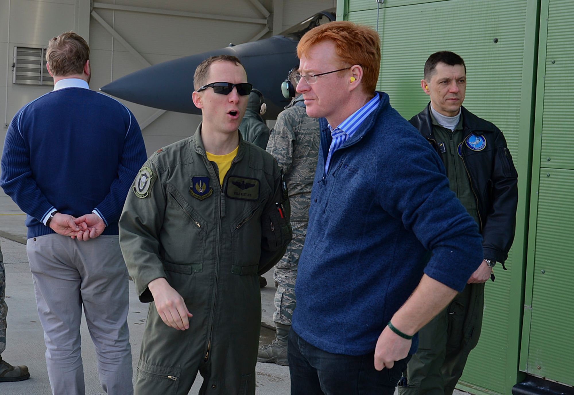 Maj. Charles Kistler, 493rd Expeditionary Fighter Squadron pilot, explains to Royal British Army Lt. Col. Fitz Fitzgibbon, British Embassy Defence Attaché, the capabilities of an F-15C Eagle during a tour of Šiauliai Air Base, Lithuania, March 21, 2014. The U.S. Air Force F-15C Eagles' participation in the NATO Baltic Air Policing mission helps ensure a safe and stable future for the Baltics while preserving the integrity of NATO's borders and NATO security. (U.S. Air Force photo by Airman 1st Class Dana J. Butler/Released)