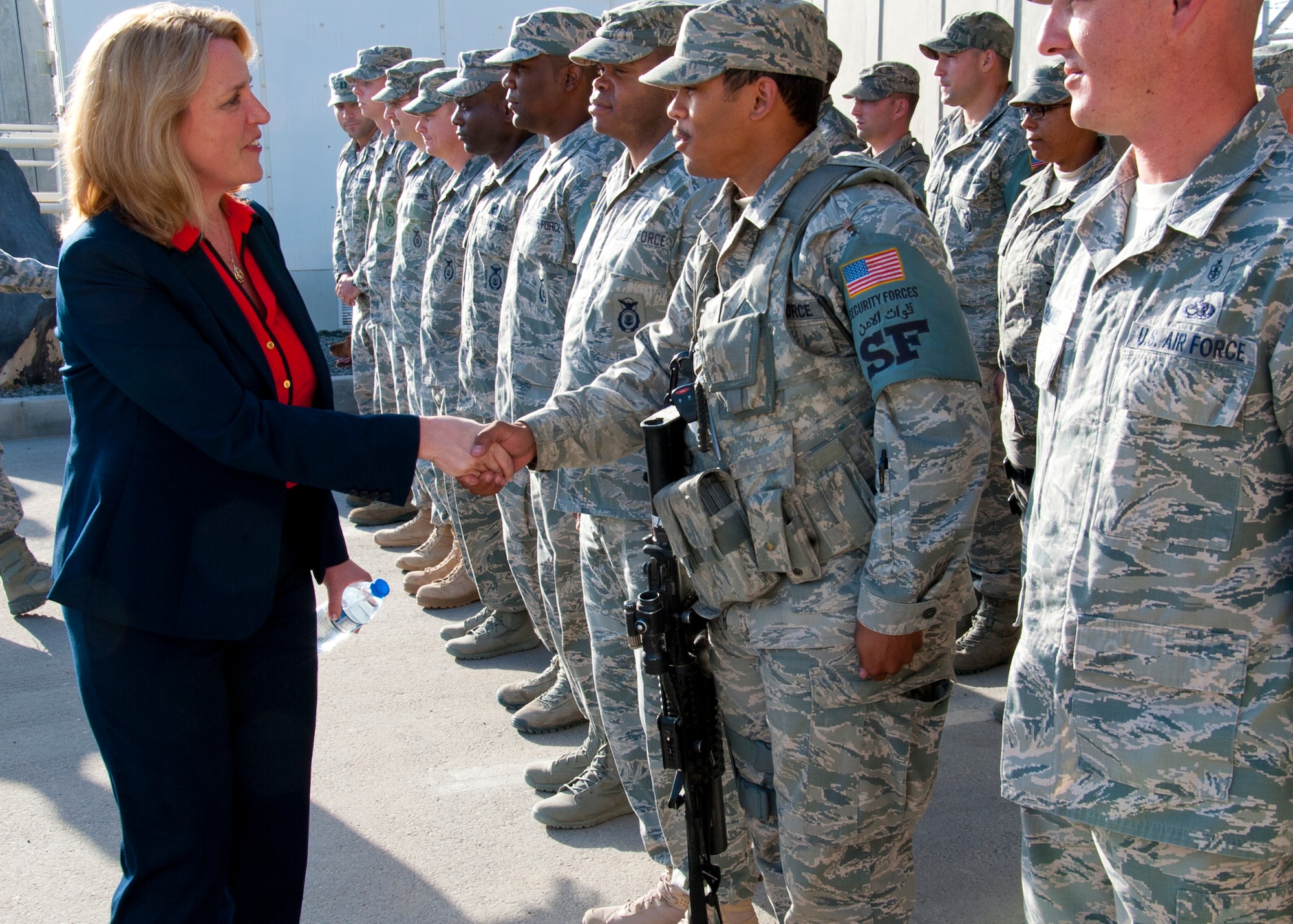 Secretary of the Air Force Deborah Lee James greets Airmen during a walking tour at the 380th Air Expeditionary Wing March 19, 2014, at an undisclosed location in Southwest Asia. During her visit James held an all call, speaking on three priorities: Taking care of people, balancing today's readiness with tomorrow's readiness and making every dollar count. (U.S. Air Force photo/Staff Sgt. Michael Means) 