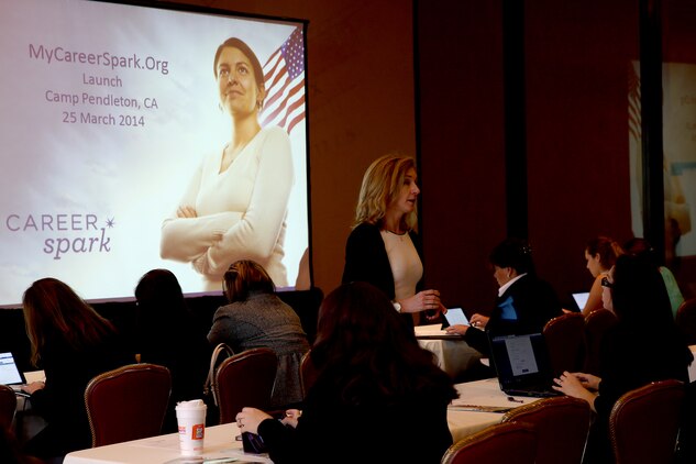 Laura Dempsey, the strategic advisor for Hiring Our Heroes, introduces Career Spark to a room of military spouses during the Hiring Our Heroes hiring fair at the Pacific Views Event Center, March 25. The new website provides a resume builder to help military spouses eliminate employment gaps and translate skills.

