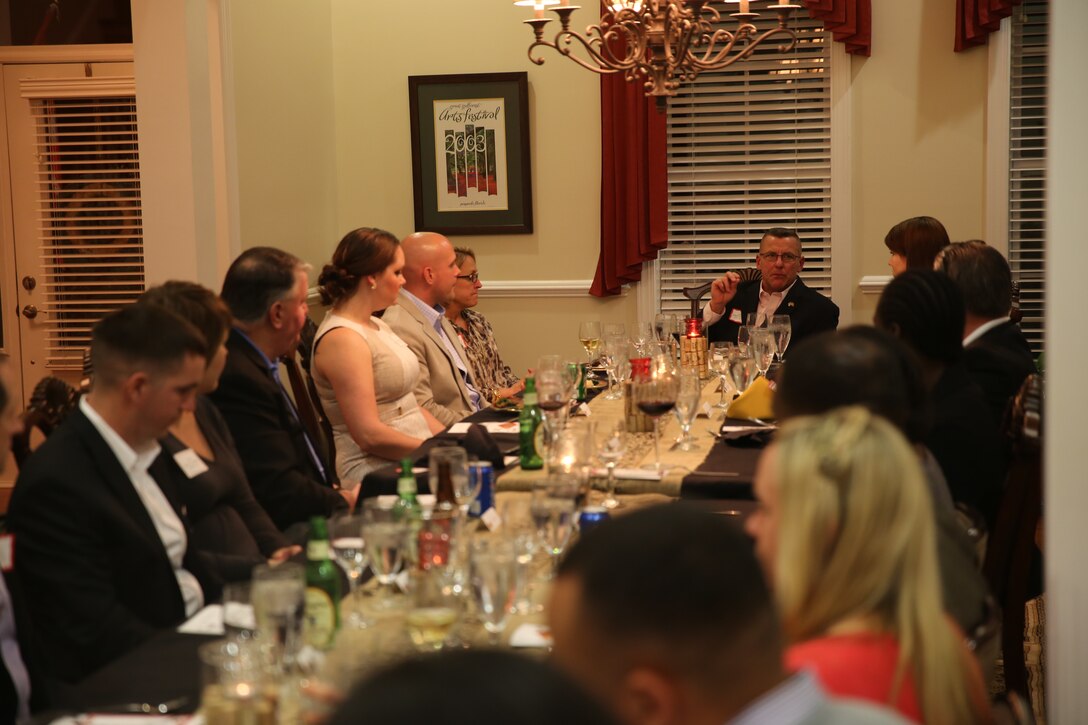 Major General Robert F. Hedelund speaks to his guests during a heroes dinner at his residence aboard Marine Corps Air Station Cherry Point, N.C., March 19, 2014, in honor of seven 2nd Marine Aircraft Wing service members who excelled on and off duty during 2013. Hedelund, the commanding general of 2nd MAW, hosted the dinner with his wife, Alicia.  
