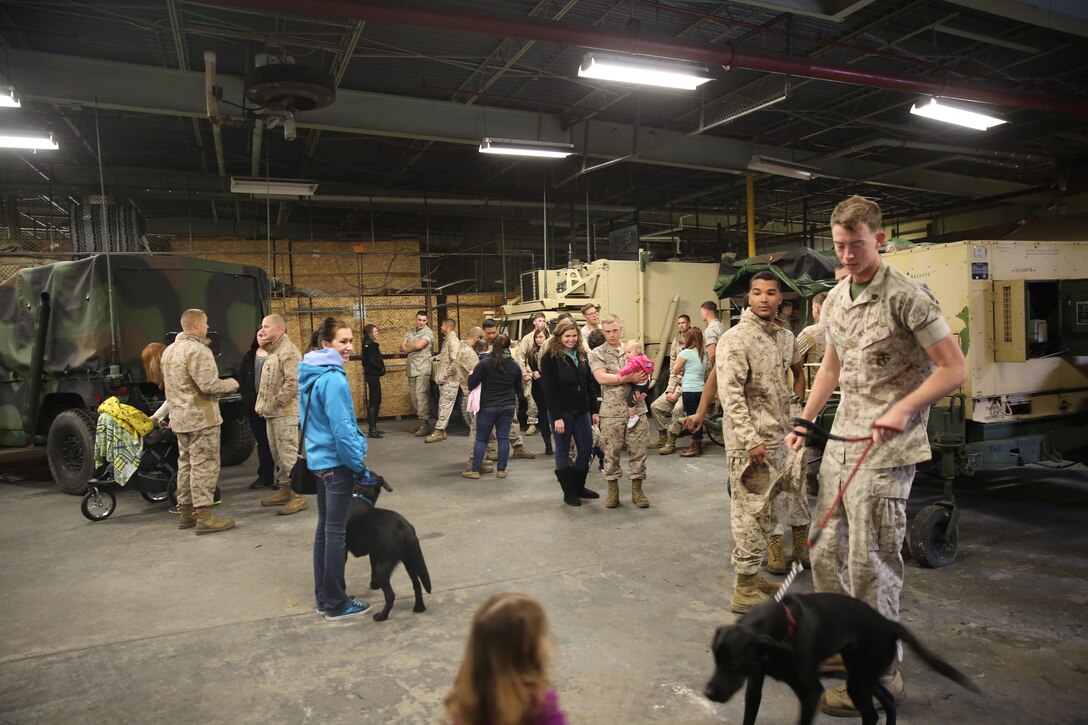 Marines and their families visit Marine Air Support Squadron 1 during the squadron’s family day event at Marine Corps Air Station Cherry Point, March 18, 2014. The Marines were encouraged to bring their spouses, children and family pets to the event.