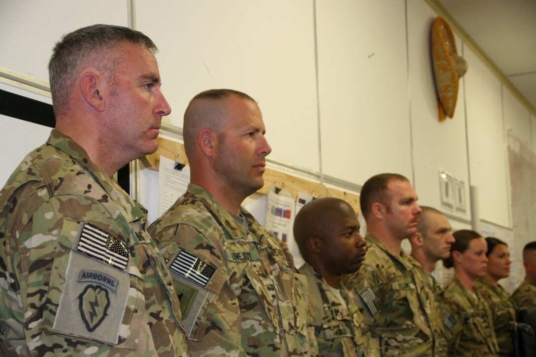 Army National Guard soldiers listen to Army Gen. Frank J. Grass, chief of the National Guard Bureau, speak aboard Camp Bastion, Helmand province, Afghanistan, March 24, 2014. General Grass visited the soldiers to assess the welfare and needs of the guard units currently deployed to Regional Command (Southwest).