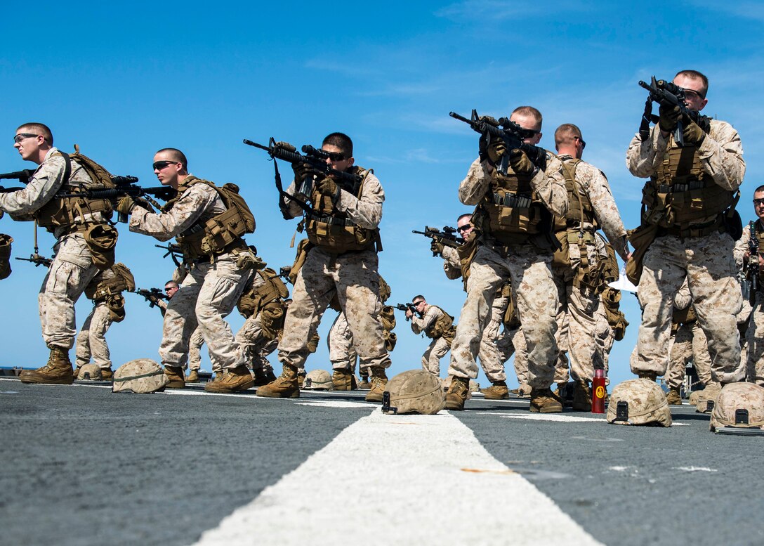140318-N-XJ695-052
GULF OF ADEN (March 18, 2014) Marines participate in rifle training aboard the amphibious dock landing ship USS Gunston Hall (LSD 44). Gunston Hall is part of the Bataan Amphibious Ready Group, and with the embarked 22nd Marine Expeditionary Unit (22nd MEU), is deployed in support of maritime security operations and theater security cooperation efforts in the U.S. 5th Fleet area of responsibility. (U.S. Navy photo by Mass Communication Specialist Seaman Jesse A. Hyatt/Released)
