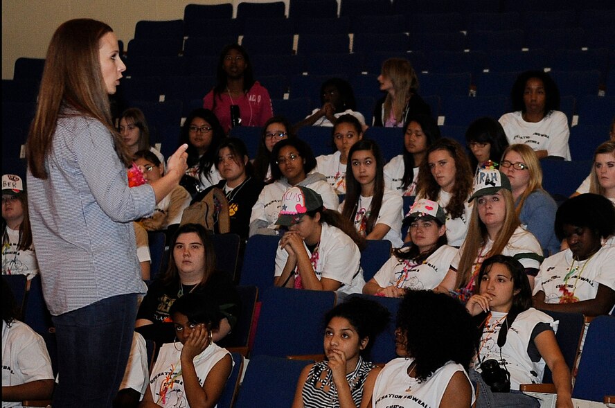 U.S. Air Force Capt. Elizabeth Belleau, 18th Wing sexual assault response coordinator, talks to high school students about the importance of not being a bystander during Operation Snowball at Kadena High School on Kadena Air Base, Japan, March 22, 2014. This program is designed to give high school students the information they need to develop good connections and refusal skills so they can make the best decision possible. (U.S. photo by Senior Airman Marcus Morris)