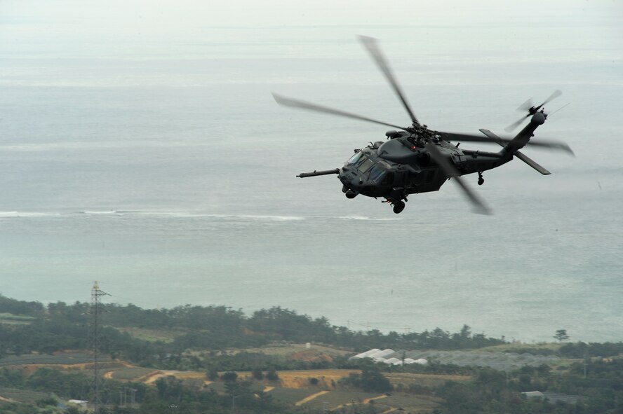 A U.S. Air Force HH-60G Pave Hawk helicopter assigned to the 33rd Rescue Squadron on Kadena Air Base, Japan, flies over Okinawa during a training exercise March 21, 2014. During the training, members of the 33rd RQS practiced recovery operations for a simulated downed pilot in a hostile environment. The Air Force has used Pave Hawks since 1982 in an array of combat and humanitarian search and rescue operations. Air Force rescue squadrons frequently train on a multitude of scenarios in order to stay prepared for potential real-world contingencies and operations. (U.S. Air Force photo by Senior Airman Maeson L. Elleman)