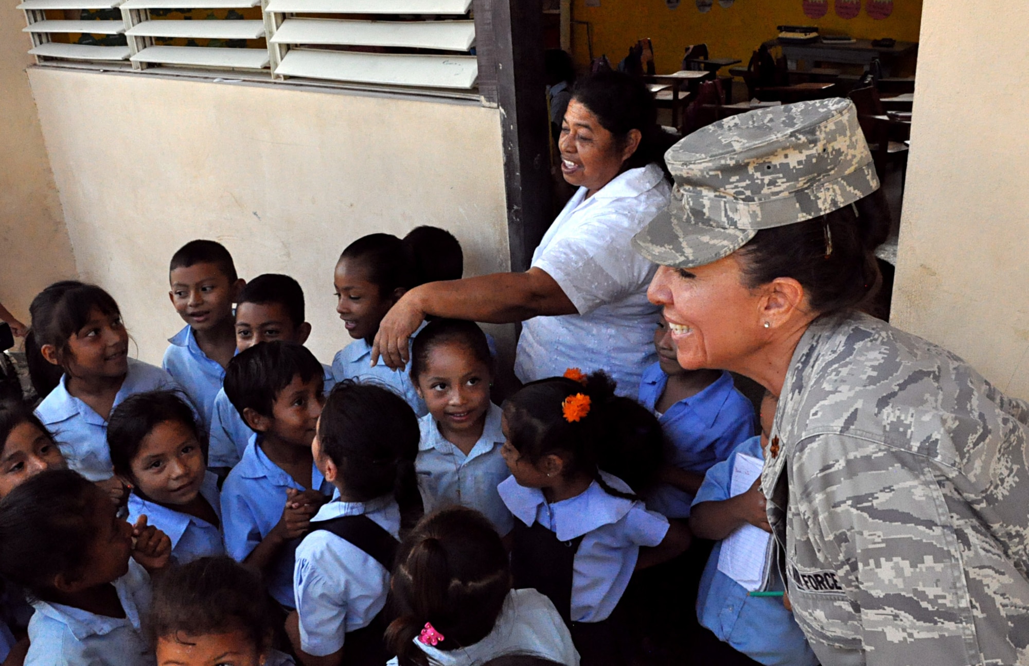 A teacher points to each of her students as they tell their names to Maj. S. Kellie Williams, New Horizons Expeditionary Medical Operations Squadron deputy commander, March 24, 2014, at the Progresso R. C. School in Progresso, Belize. Williams and other U.S. military medical representatives visited three schools in the Corozal region in preparation for upcoming medical readiness training exercises, or MEDRETES, which will incorporate the training and medical expertise of both Belizean and U.S. medical professionals as they learn from one another to provide medical care to residents near Chunox, Progresso and Libertad. (U.S. Air Force photo by Tech. Sgt. Kali L. Gradishar/Released)