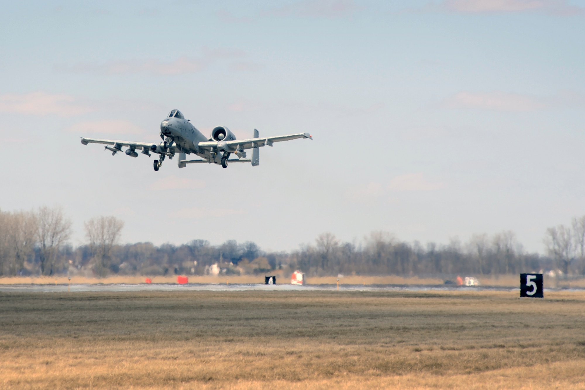 140326-Z-HC784-079 -- An A-10 Thunderbolt II from the 107th Fighter Squadron, 127th Wing, Michigan Air National Guard, launches from Selfridge Air National Guard Base, Mich., March 26, 2014, enroute to a Combat Search and Rescue exercise taking place at and around the Grayling Air Gunnery Range in northern Michigan. During the exercise A-10s from Selfridge and the 122nd Fighter Wing, Indiana Air National Guard, worked closely with HH-60 Blackhawk helicopters from the New York Air National Guard’s 106th Rescue Wing to conduct a broad range of training scenarios. (U.S. Air National Guard photo by John S. Swanson / Released)