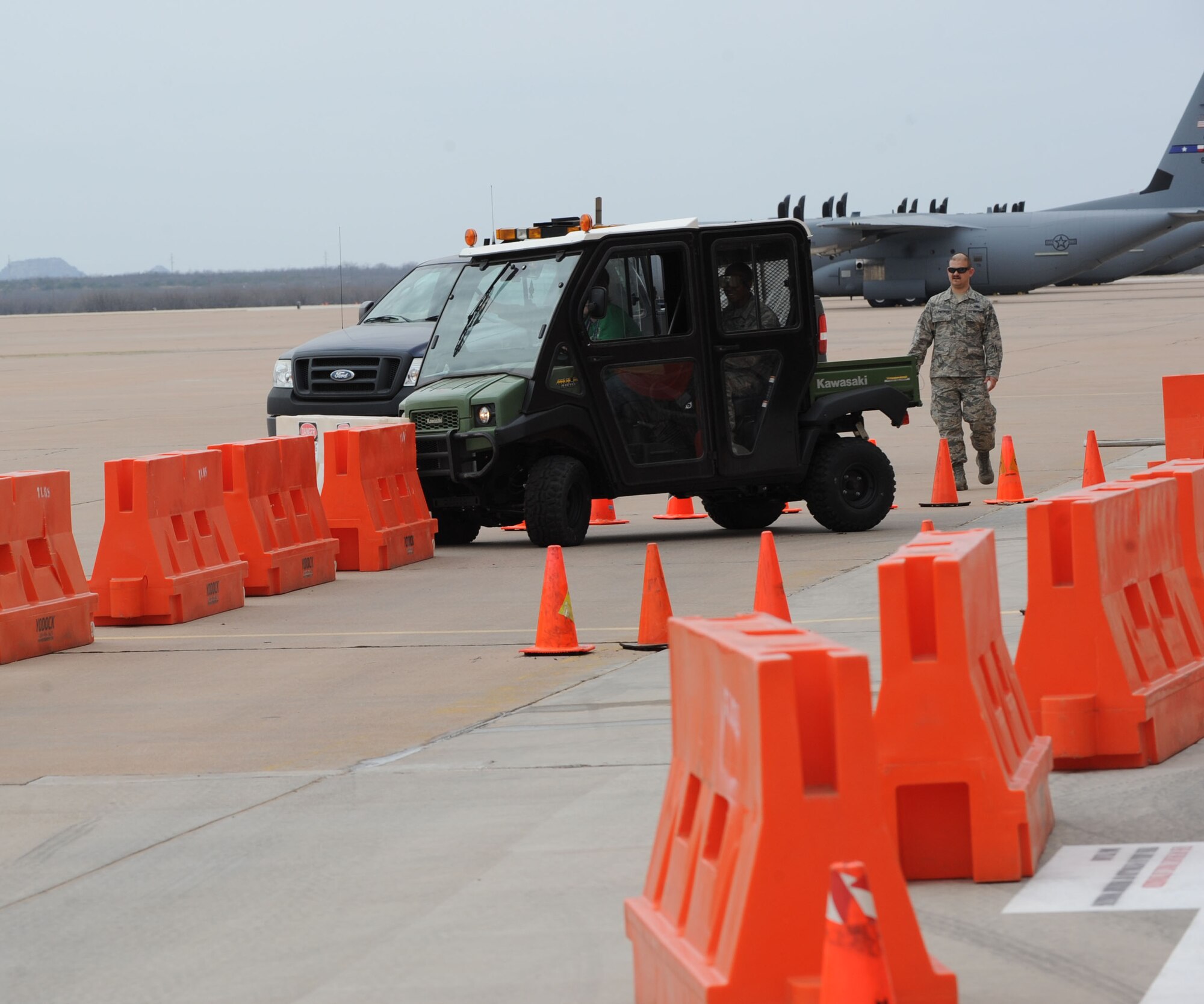 U.S. Air Force Staff Sgt. Kassondra Cline, 39th Airlift Squadron, runs into a barrier during the 317th Airlift Group’s Comprehensive Airman Fitness event March 21, 2014, at Dyess Air Force Base, Texas. Selected Airmen consumed a limited amount of alcohol and attempted driving on a closed course. This event was conducted to inform and remind Airmen about the hazards of alcohol abuse, even when only a few drinks have been consumed. (U.S. Air Force photo by Airman 1st Class Autumn Velez/Released)