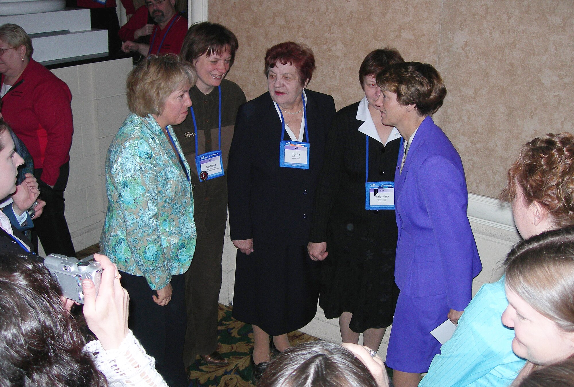 Retired Air Force Col. Eileen Collins, right, talks with Russian pilots attending the 17th Annual International Women in Aviation Conference in Nashville, Tenn., March 25, 2006. (U.S. Air Force photo/Annette Crawford)